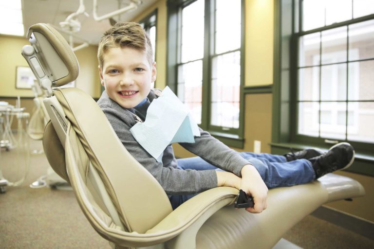 young boy at the dentist office